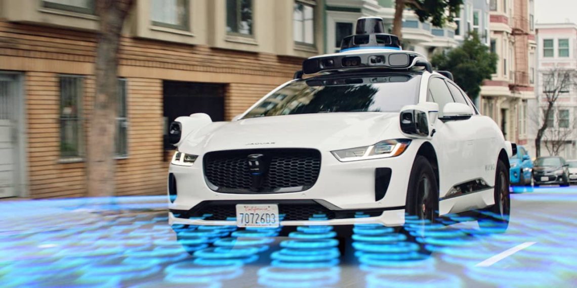 Waymo autonomous vehicle equipped with lidar sensors during robotaxi operations